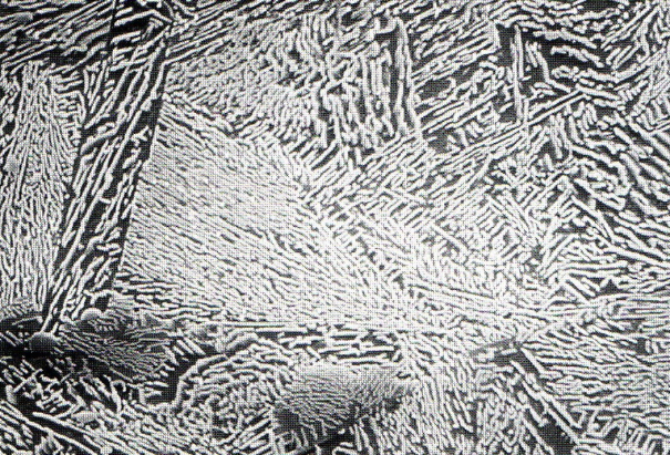 Fig. 11: Bainitic matrix of nodular graphite cast iron, 500:1, 100:1, etched