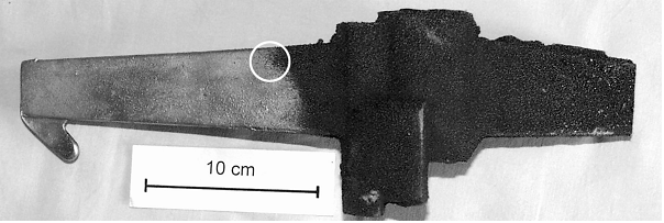 Fig. 1: Massive penetration on an aluminum casting, the adhesive sand crusts could be removed after extensive blasting (left side)