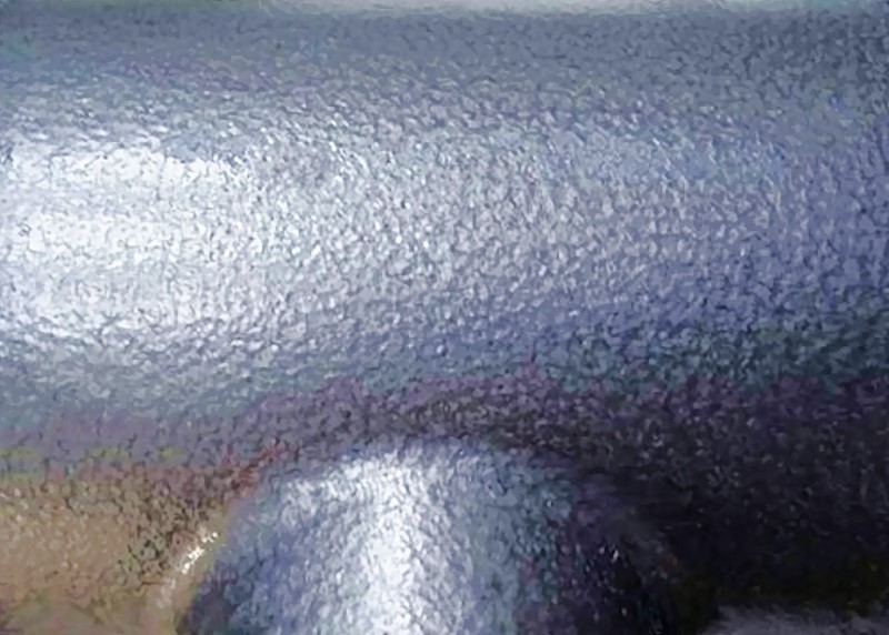 Bild 1: Oberfläche eines Gussteils mit Hammerschlaglackierung